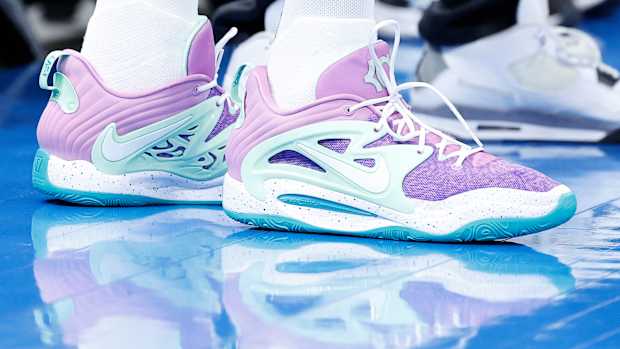 View of Kevin Durant's purple and white Nike shoes.